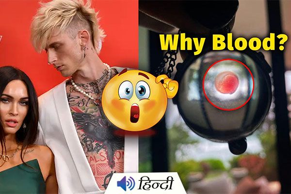 Machine Gun Kelly Wears Blood Around His Neck